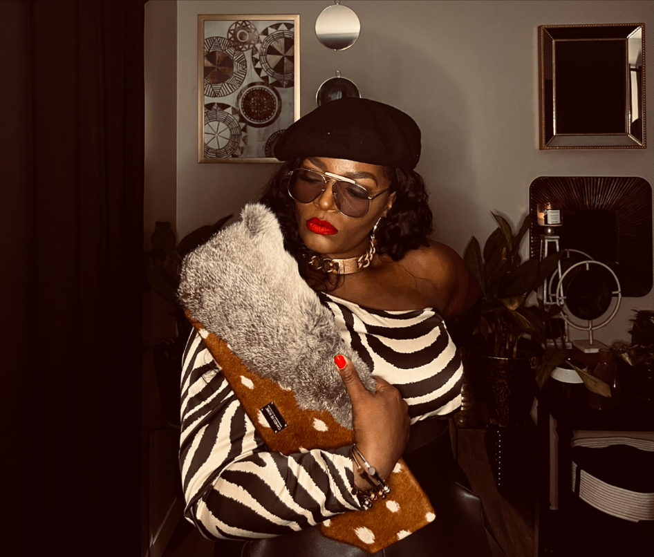 Zebra one-shoulder top — beret, fur polka clutch